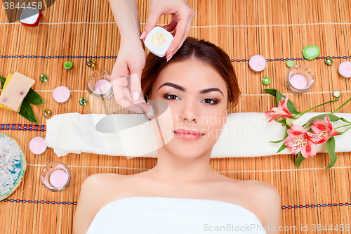 Image of Beautiful young woman at a spa salon