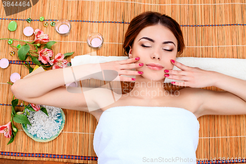 Image of Beautiful young woman at a spa salon