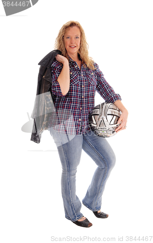 Image of Blond woman with motorcycle helmet.