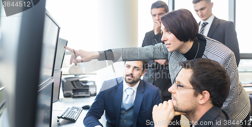 Image of Business team working in corporate office.