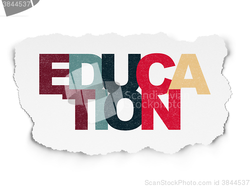 Image of Education concept: Education on Torn Paper background