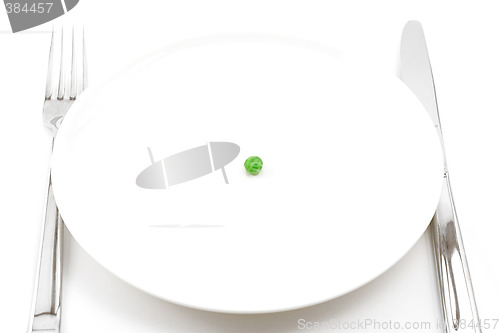 Image of single pea on a plate