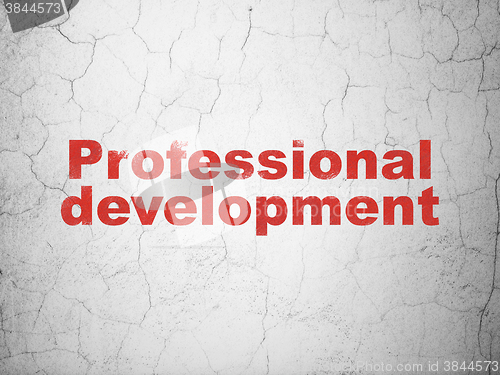 Image of Learning concept: Professional Development on wall background