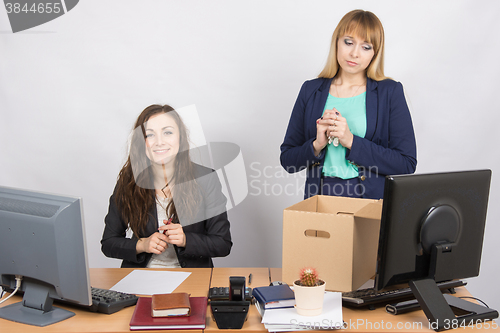 Image of The dismissal of colleagues is joy in the office employee