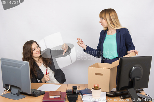 Image of Office employee humiliating gesture of laid-off colleagues who fights back