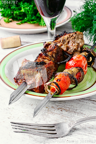 Image of Meat roasted on skewers