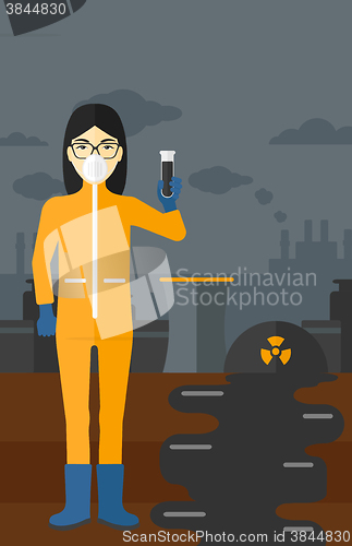 Image of Laboratory assistant with test tube.