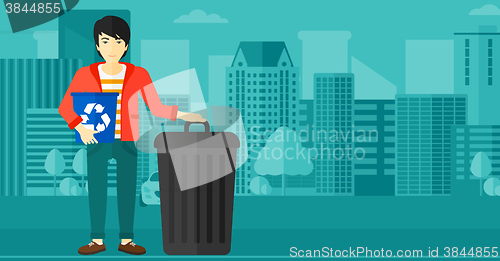 Image of Man with recycle bins.