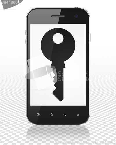 Image of Safety concept: Smartphone with Key on display