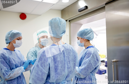 Image of group of surgeons in operating room at hospital