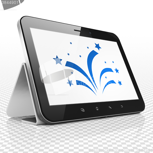 Image of Holiday concept: Tablet Computer with Fireworks on display