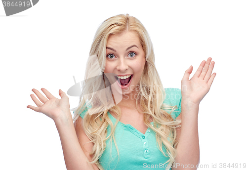 Image of surprised smiling young woman or teenage girl