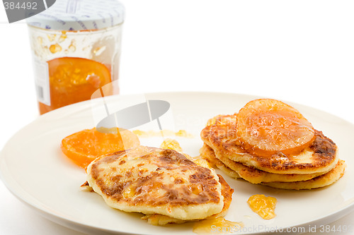 Image of small cottage pancakes with orange jam