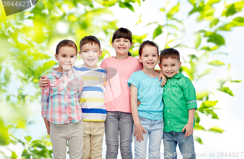 Image of happy smiling little children hugging