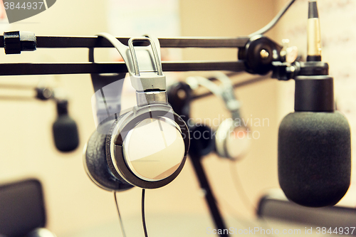 Image of headphones at recording studio or radio station