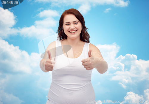 Image of plus size woman in underwear showing thumbs up