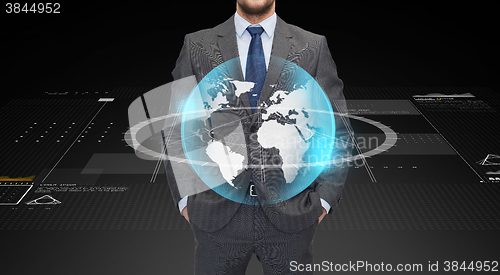 Image of close up of businessman with earth globe