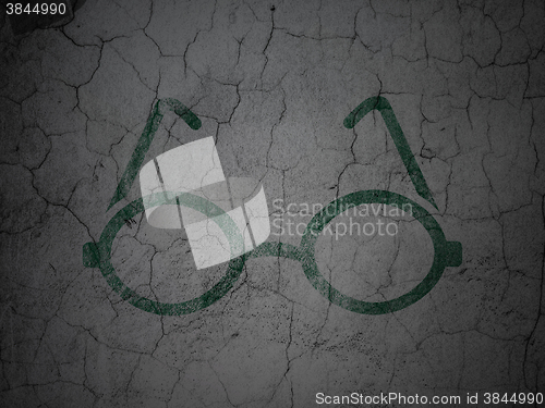 Image of Learning concept: Glasses on grunge wall background