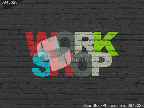 Image of Education concept: Workshop on wall background