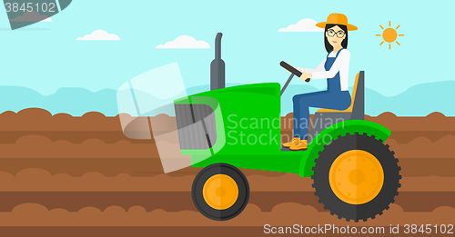 Image of Farmer driving tractor.