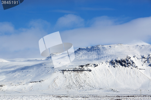 Image of Snowy mountain landscape, Iceland