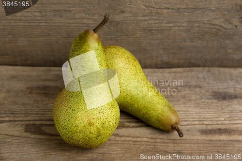 Image of Pears on wooden background