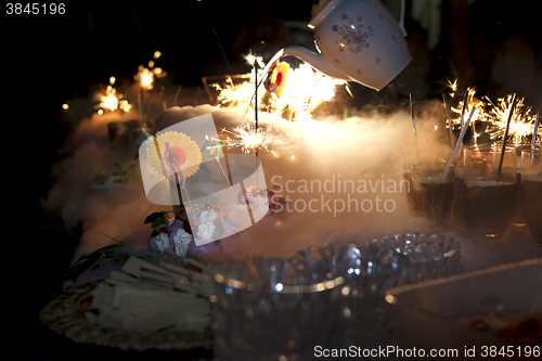 Image of Fireworks at a table for dessert