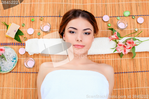 Image of Beautiful young woman at a spa salon