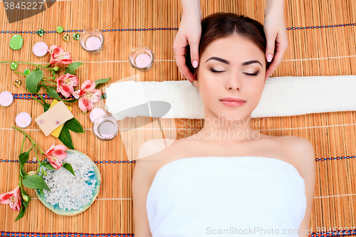 Image of Beautiful young woman at a spa salon