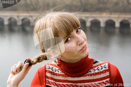 Image of Portrait of the nice girl outdoor