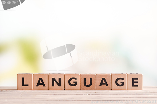 Image of Language lesson sign on a table