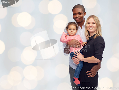 Image of happy multiracial family with little child