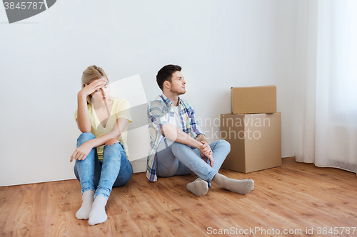 Image of unhappy couple having argument at home