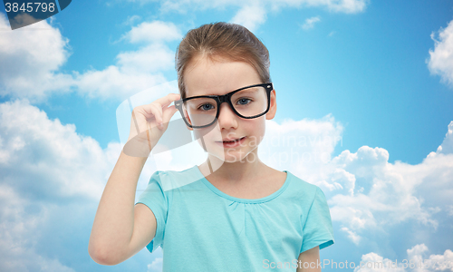 Image of happy little girl in eyeglasses