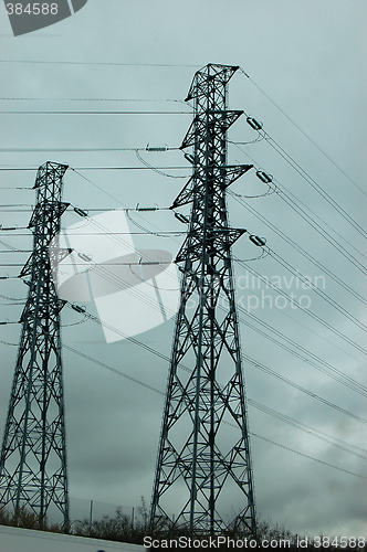 Image of Electric powerlines on a gray sky