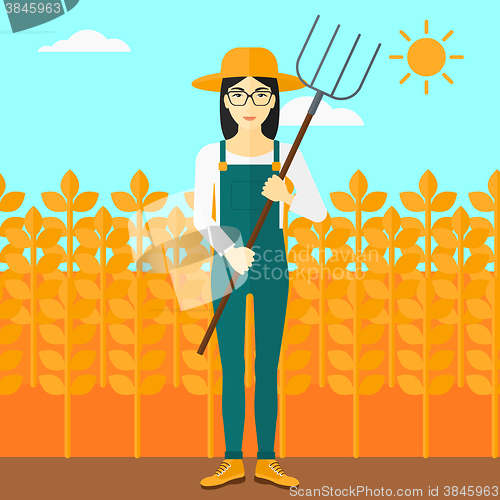 Image of Farmer with pitchfork.