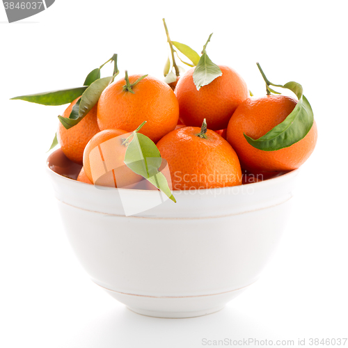 Image of Tangerines on ceramic white bowl 