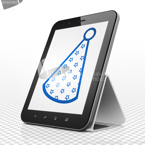 Image of Entertainment, concept: Tablet Computer with Party Hat on display