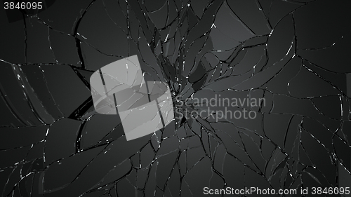 Image of Broken and cracked shapp glass on black