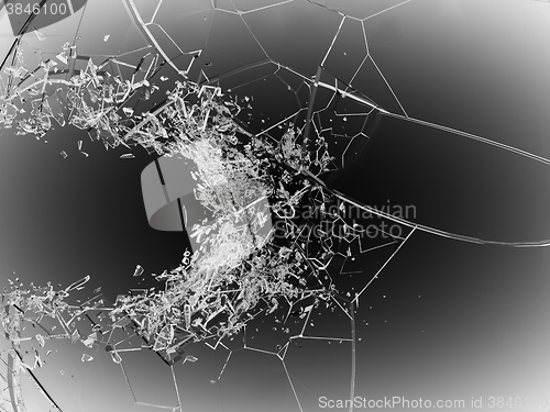 Image of Breaking or demolishing glass on grey