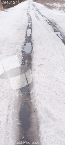 Image of spring road with snow