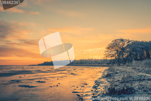 Image of Frozen lake in the morning sunrise