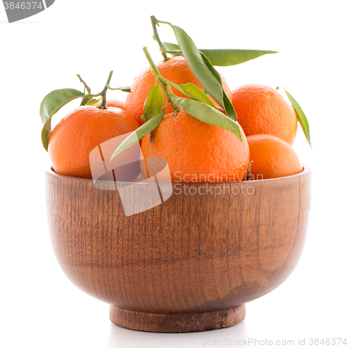 Image of Tangerines on wooden  bowl 