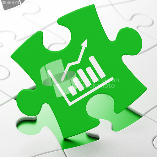 Image of Advertising concept: Growth Graph on puzzle background