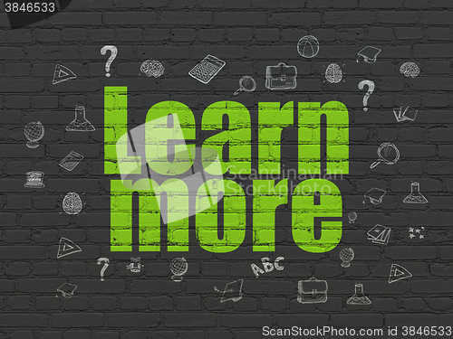 Image of Education concept: Learn More on wall background