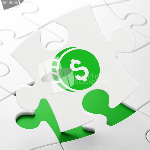 Image of Money concept: Dollar Coin on puzzle background