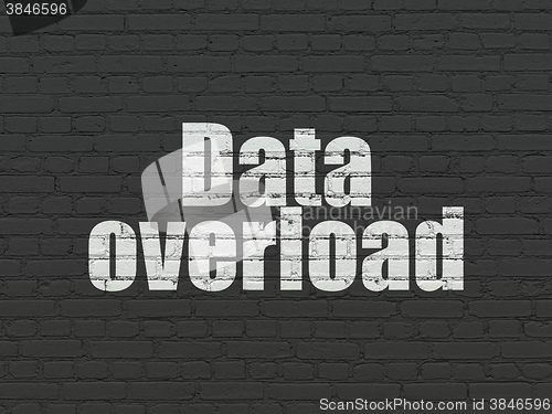 Image of Information concept: Data Overload on wall background