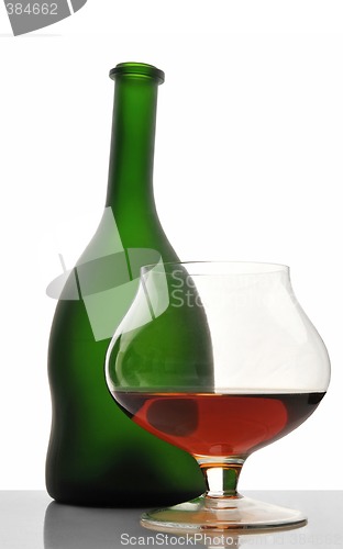 Image of Bottle of cognac, brandy and glass