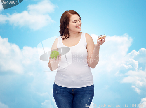 Image of happy plus size woman choosing apple or donut