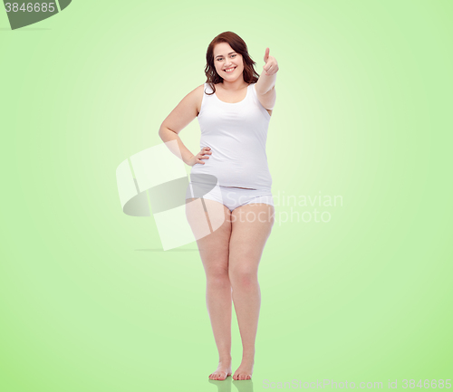 Image of plus size woman in underwear showing thumbs up